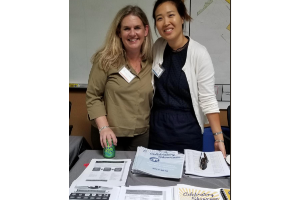 AAR site liaison and AAR program coordinator Dr. Jeong Choe greet the crowd with winning smiles and useful information.